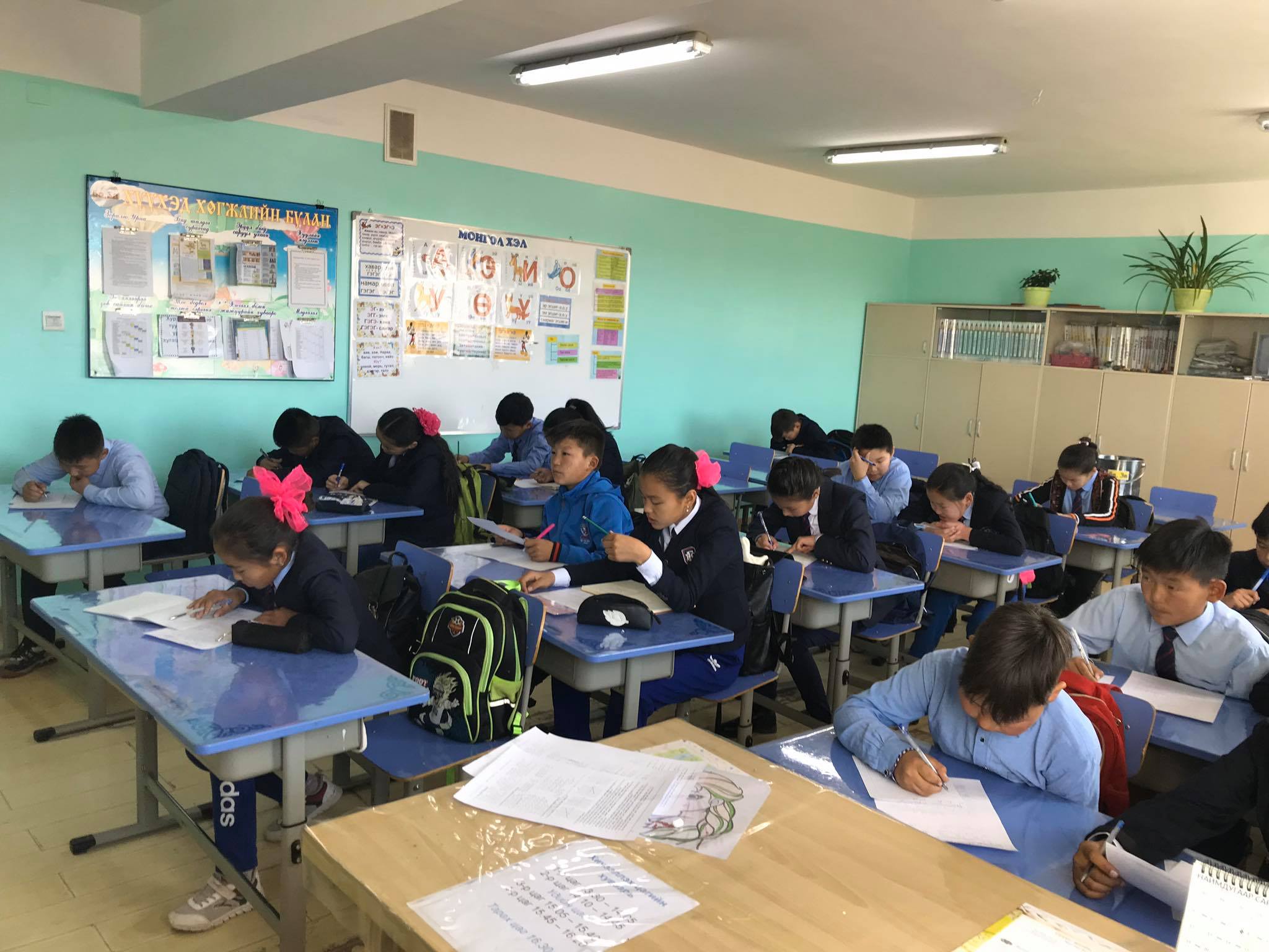 Schoolchildren from Binder school, near Khurkh in northeast Mongolia, writing letters to their counterparts on Socotra